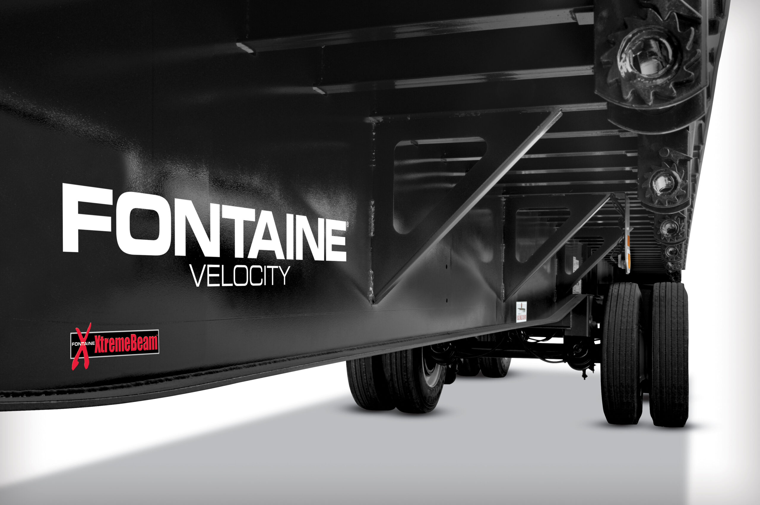 A close-up view of a Fontaine Velocity trailer showcasing its branding and structure.